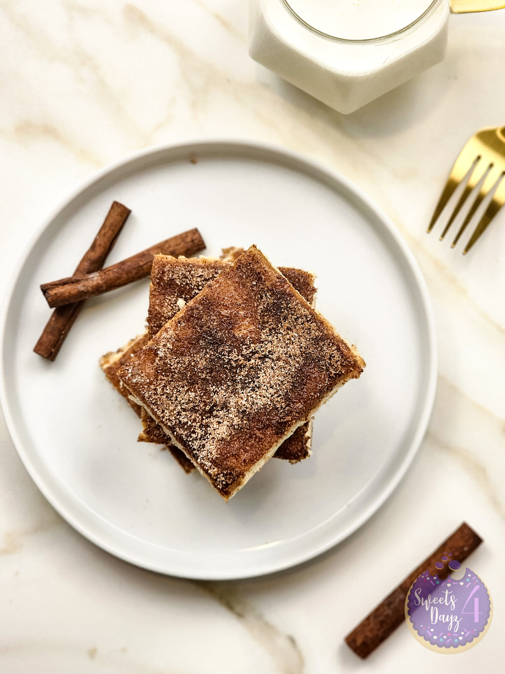 Churro Cheesecake Bars on Gold Marble