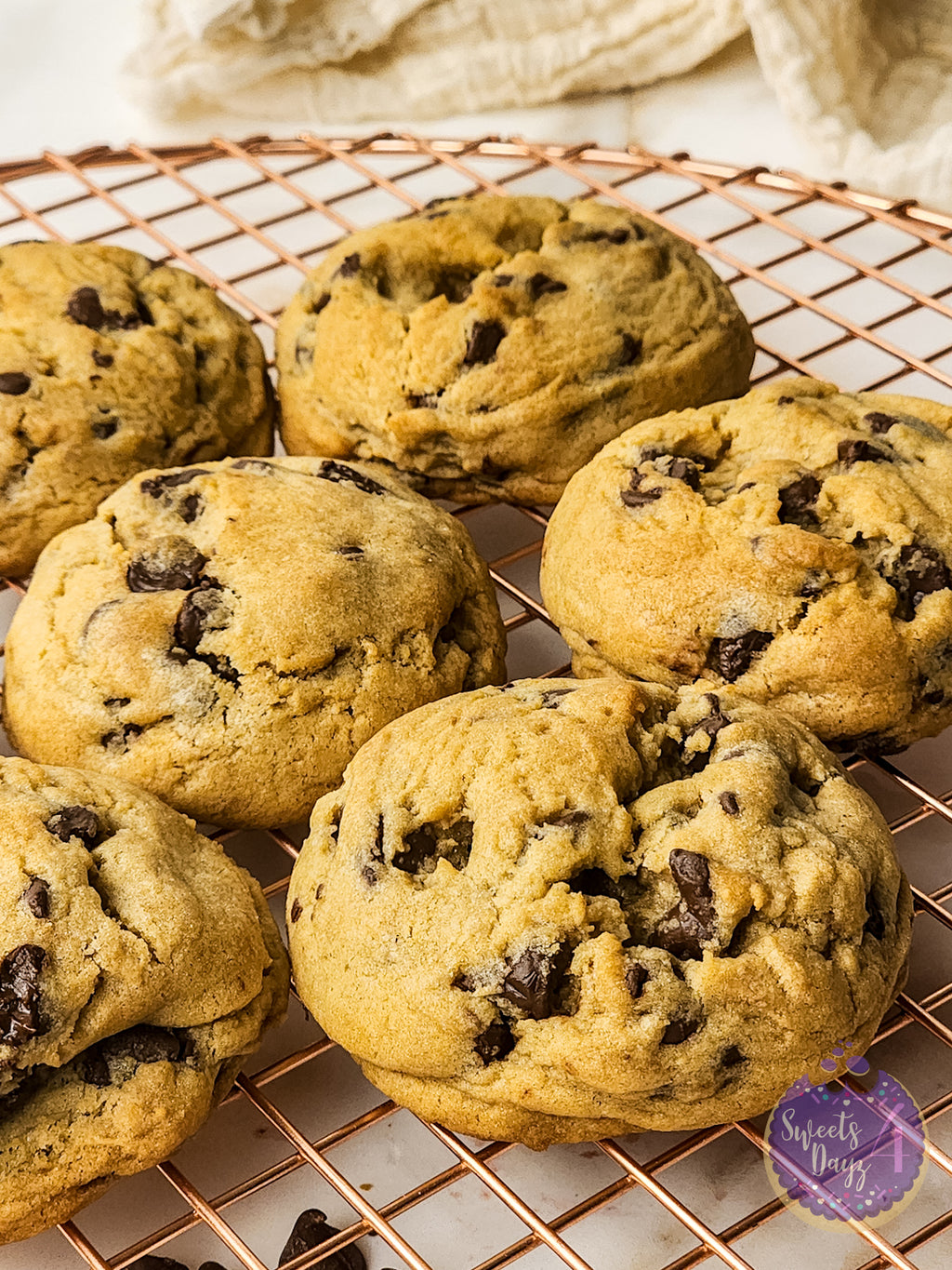 Soft Thick Chocolate Chip Cookies on Gold Marble
