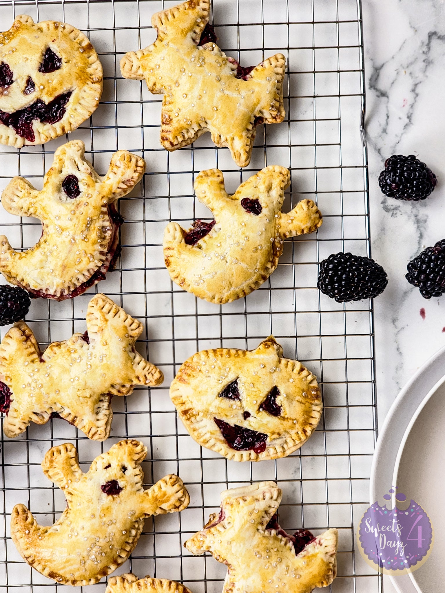 Spooky Fruit Hand Pies on Marble