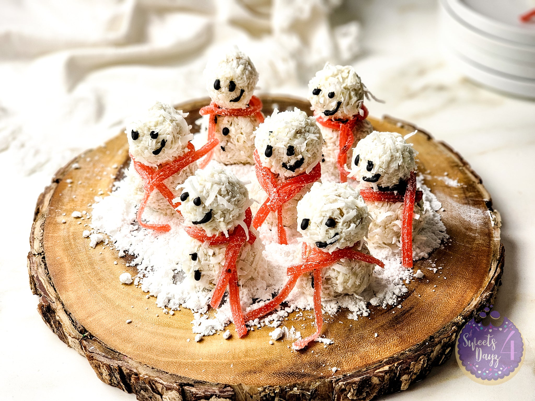 Snowman Truffles on Gold Marble