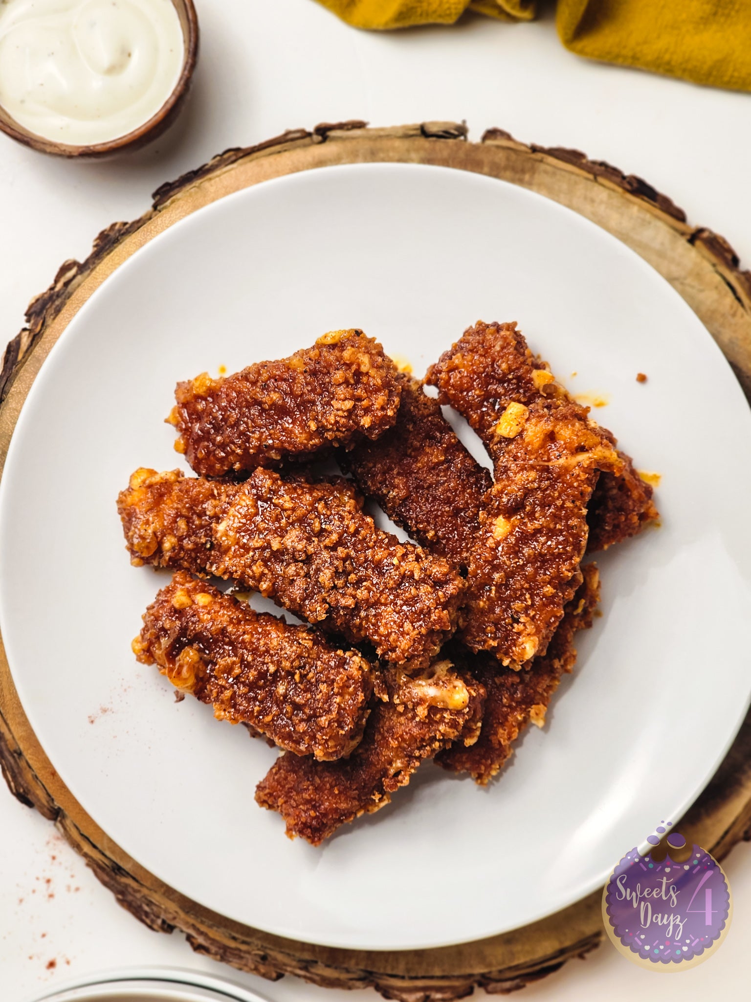 Copycat Chilis Nashville Hot Mozzarella Sticks on White