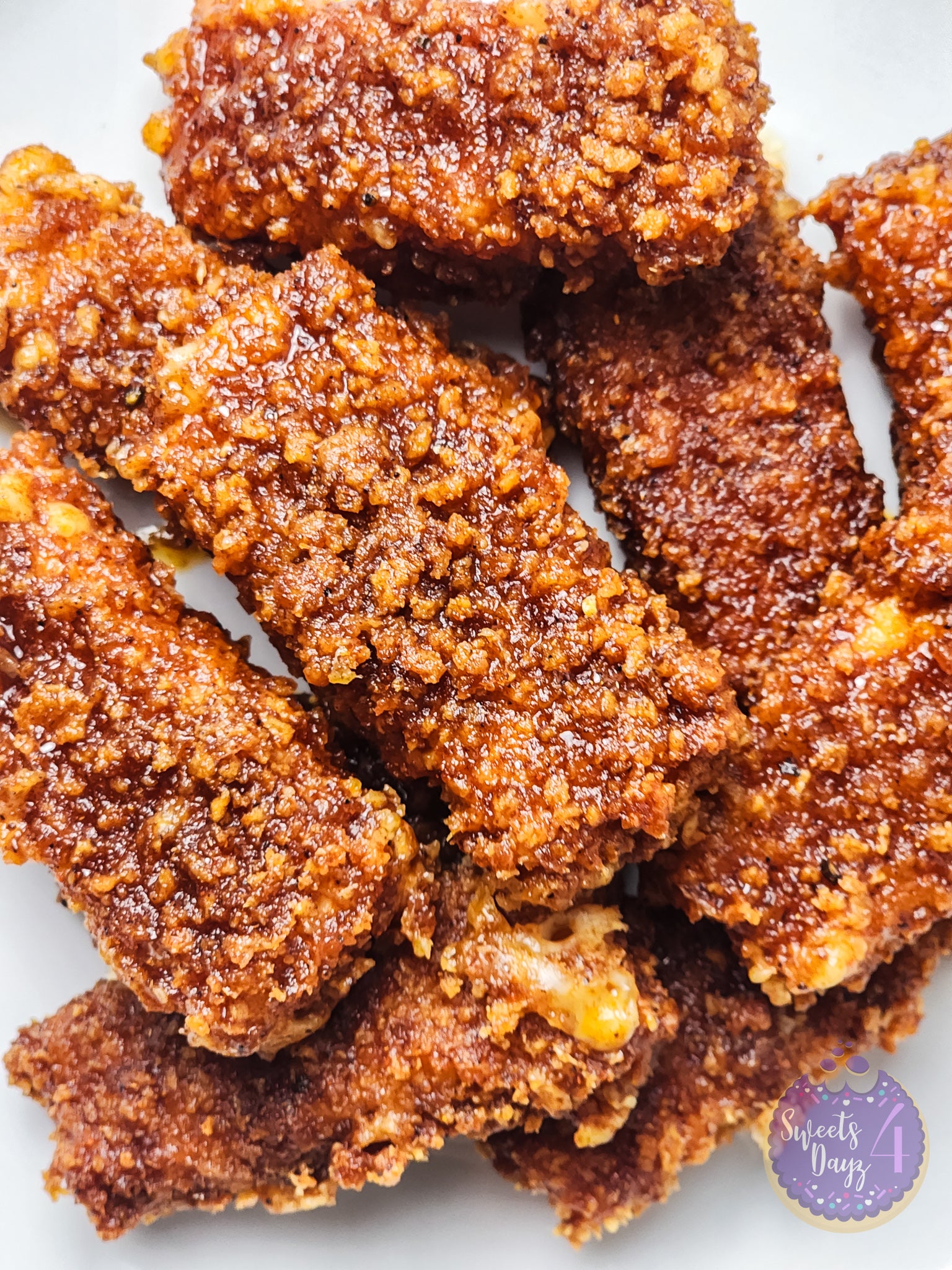 Copycat Chilis Nashville Hot Mozzarella Sticks on White