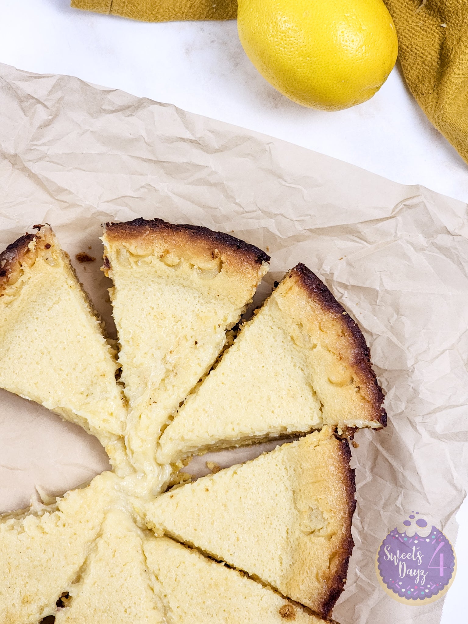 Lemon Gooey Butter Cake on Gold Marble