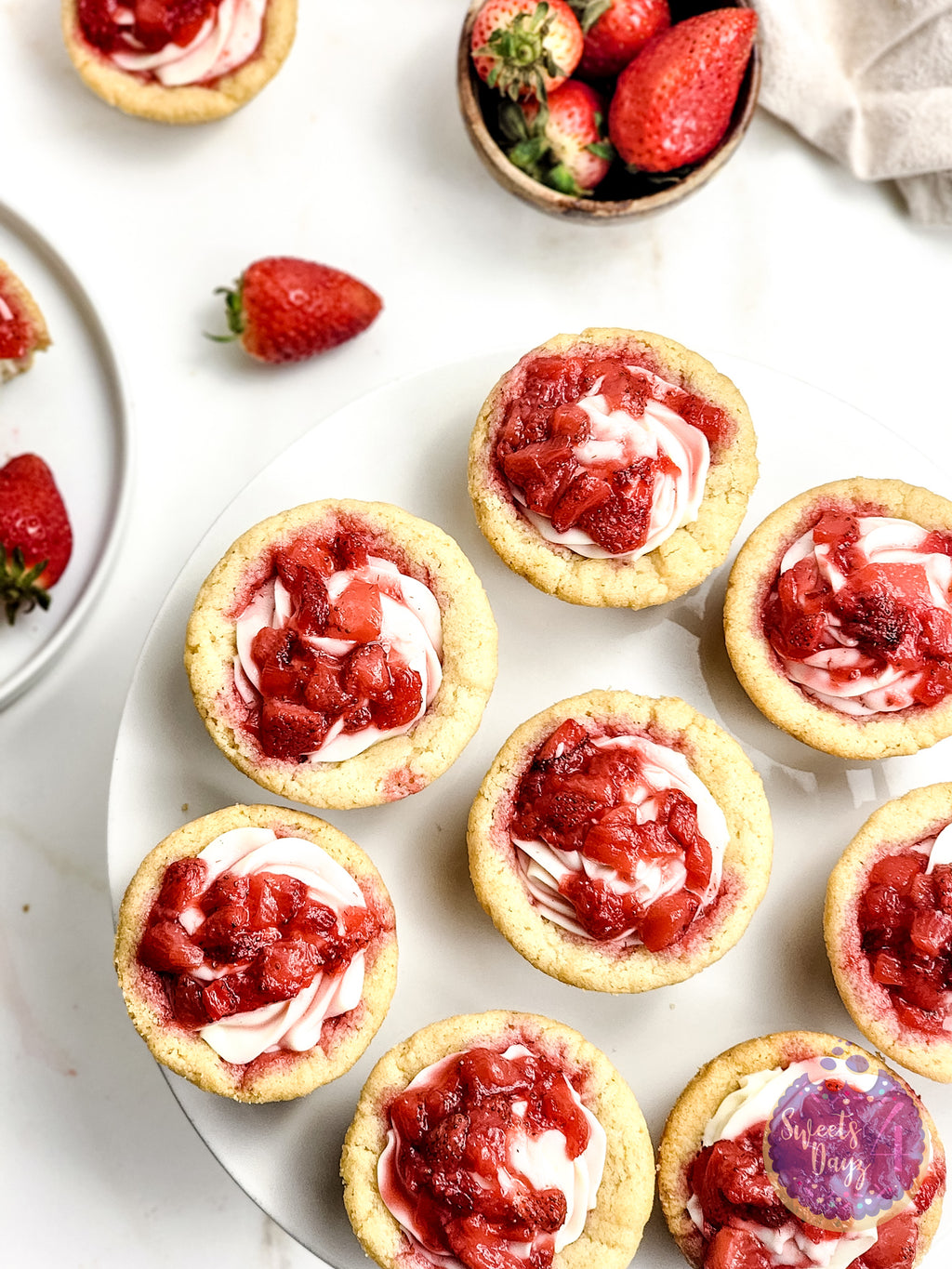 Strawberry Cheesecake Cookie Cups on Gold Marble