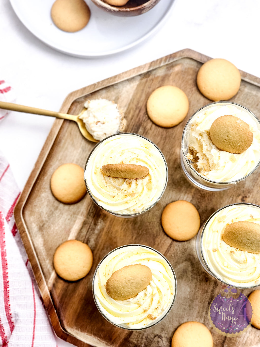 No Bake Vanilla Cheesecake Cups on Marble