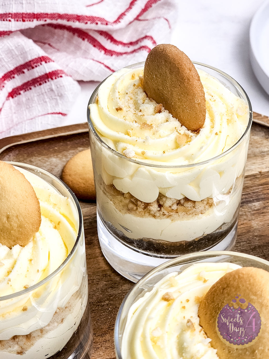 No Bake Vanilla Cheesecake Cups on Marble