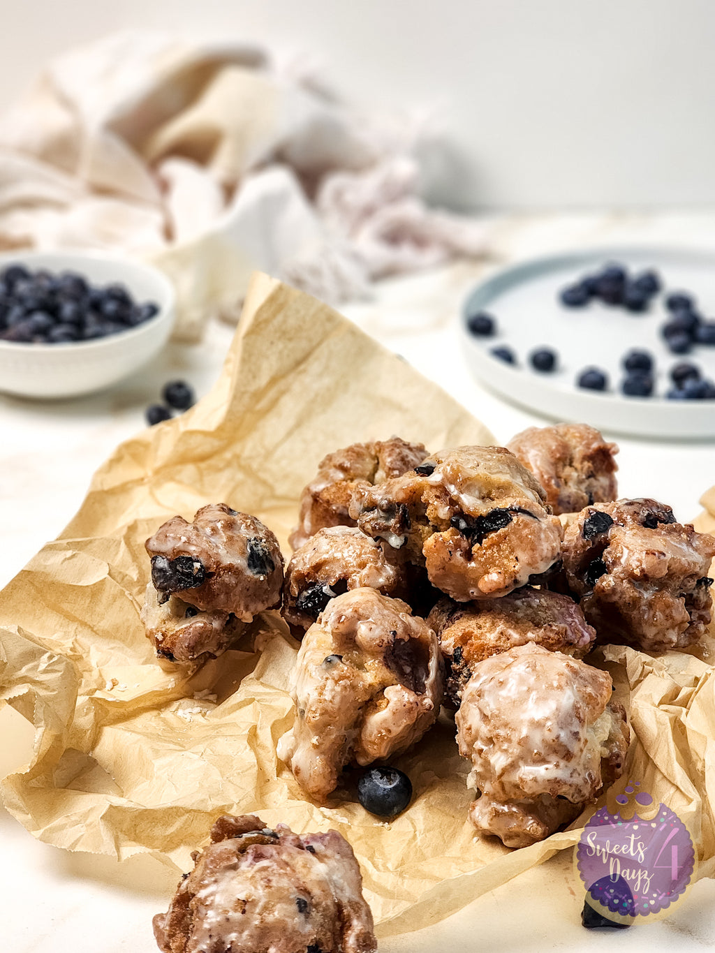 Blueberry Donut Holes on Gold Marble