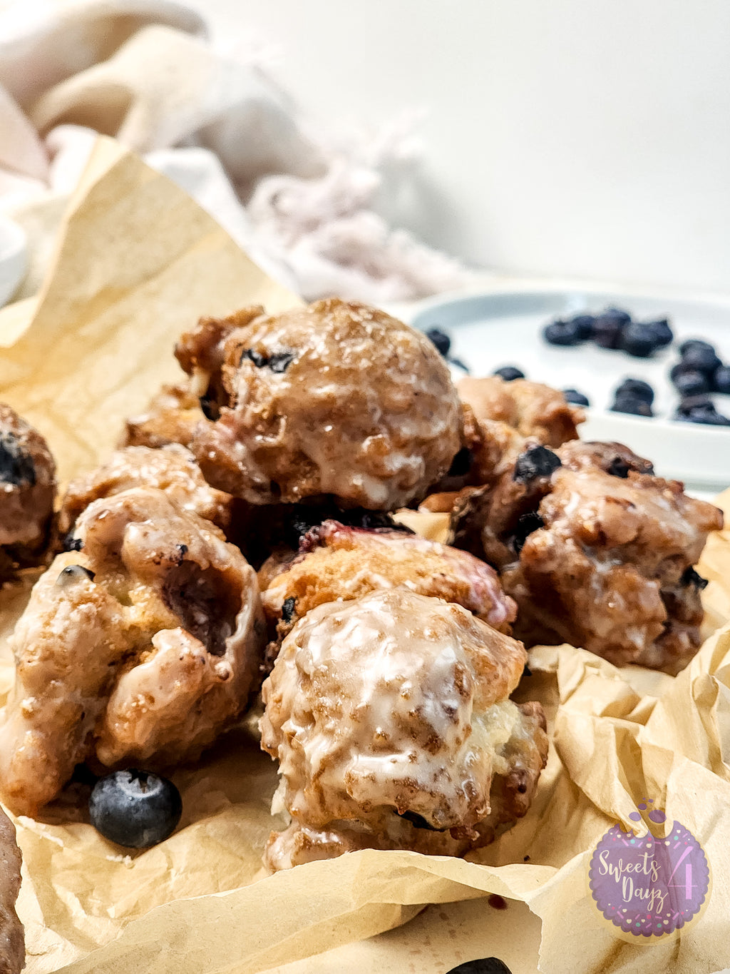 Blueberry Donut Holes on Gold Marble