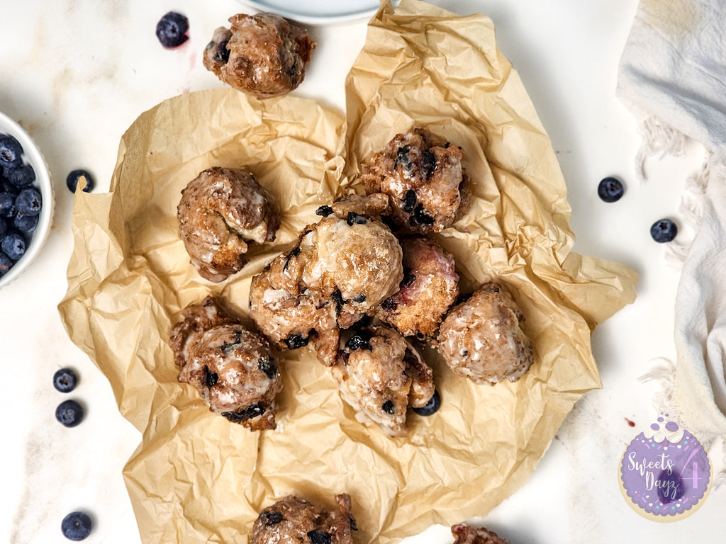 Blueberry Donut Holes on Gold Marble