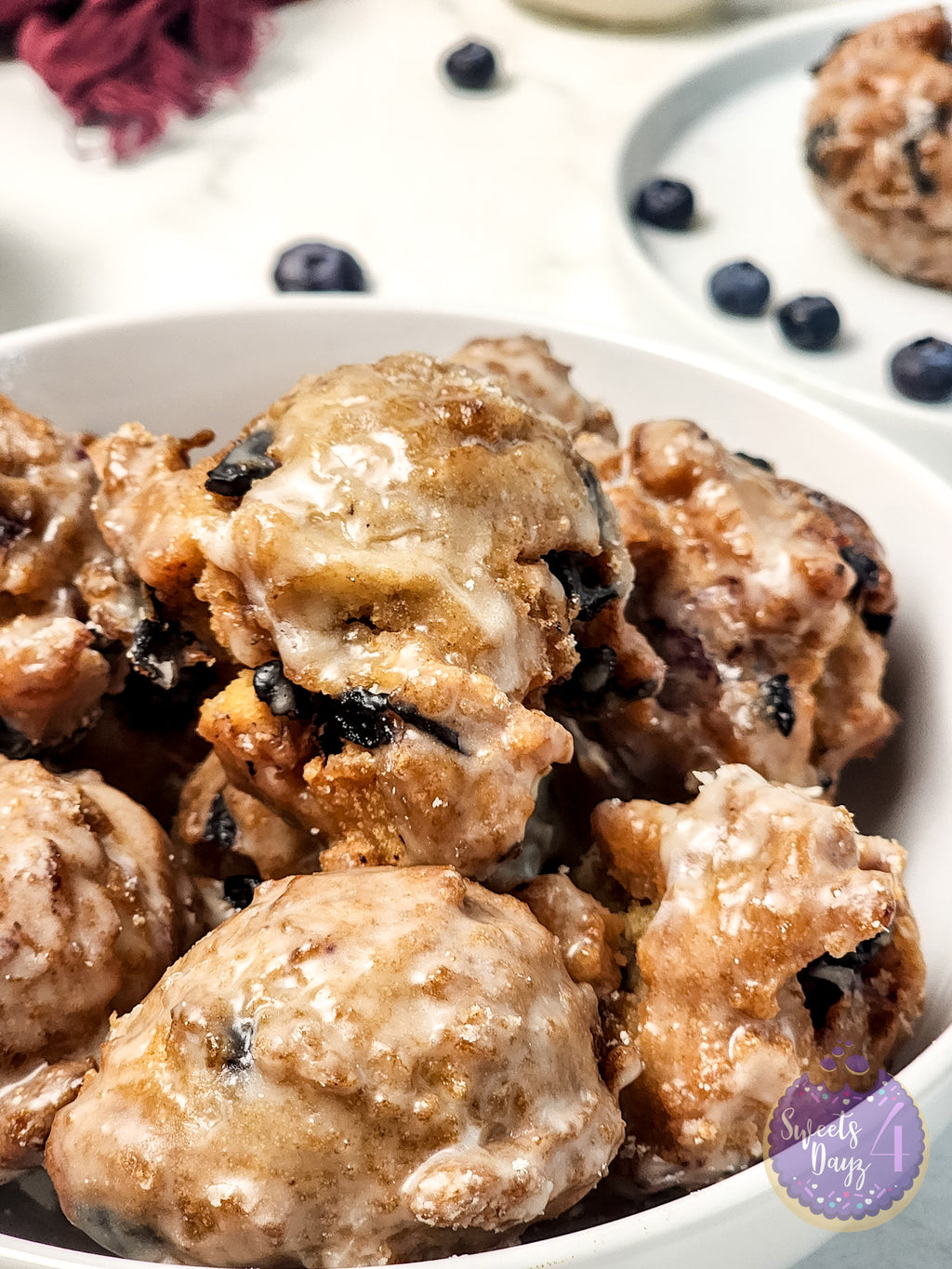 Blueberry Donut Holes on Marble