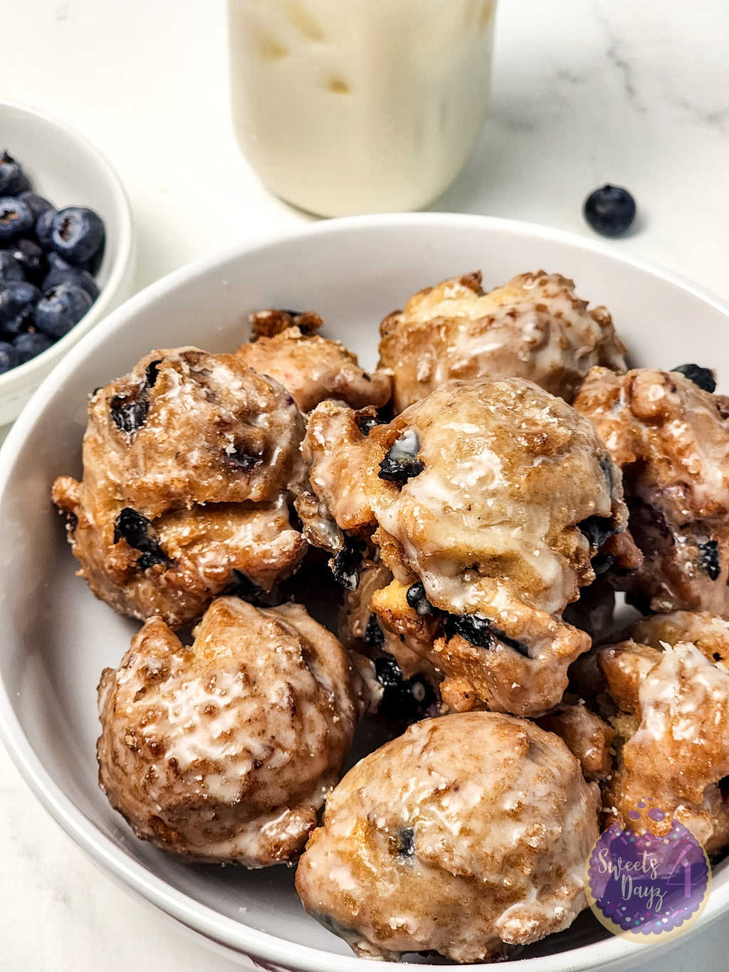 Blueberry Donut Holes on Marble